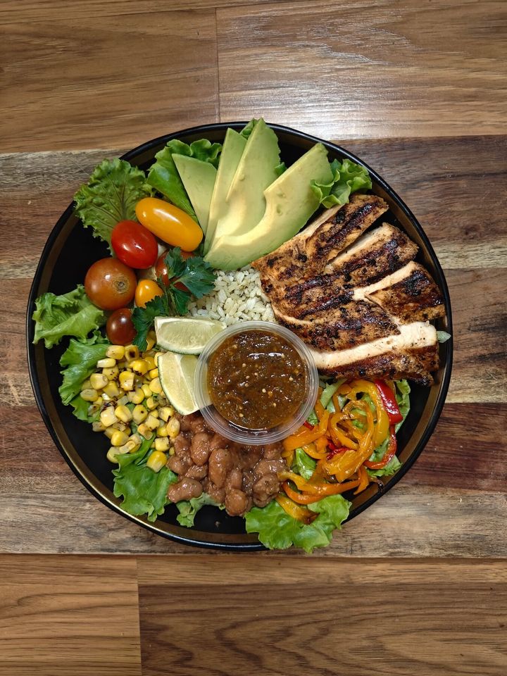 Chimichurri grilled chicken and avocado grain bowl plated by Chef Brian Schultze, private chef.